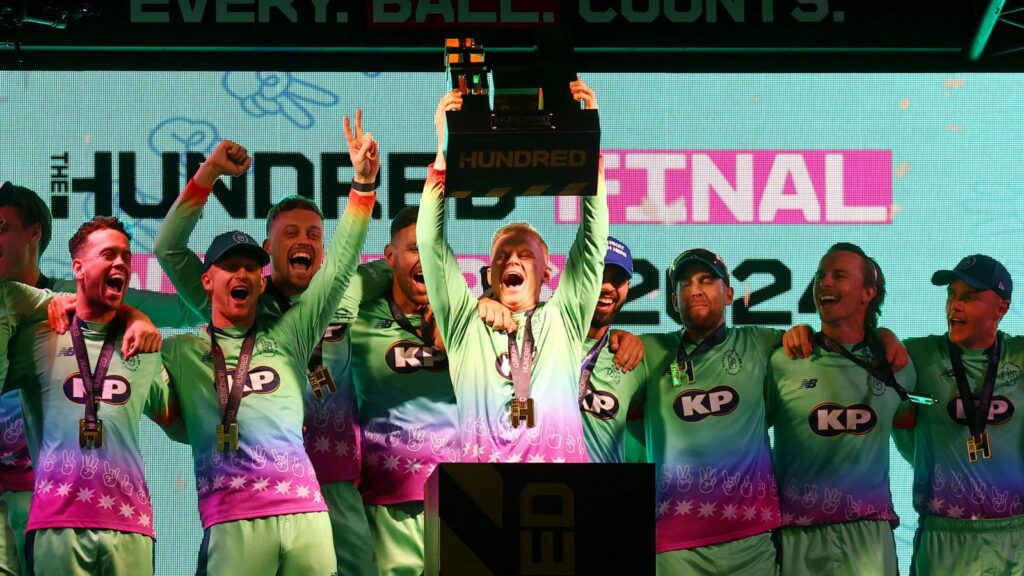 Oval Invincibles' Sam Billings lifts the trophy after winning the men's Hundred final against Southern Brave. Pic: Action Images via Reuters/Matthew Childs