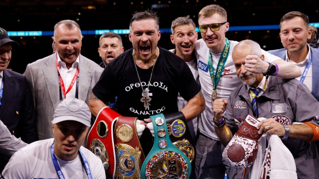 Usyk celebrates winning his fight against Daniel Dubois. Pic: Reuters